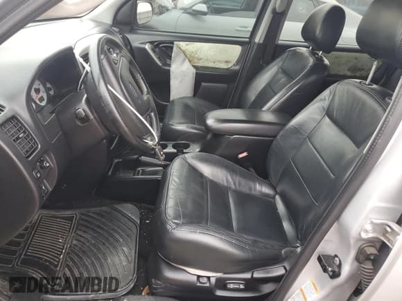 ✅ 2003 Ford Escape Limited • VIN: 1FMCU94113KE19584 • Lot: 80127324. Listed on Copart with 267,202 mi. Free auction sales archive from the USA and detailed vehicle history report at DreamBid. Image 7.