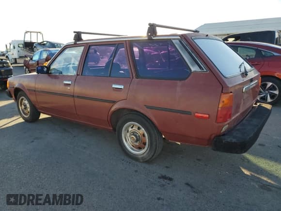 ✅ 1983 Toyota Corolla • VIN: JT2AE72W3D5007980 • Lot: 81855344. Listed on Copart with 124,611 mi. Free auction sales archive from the USA and detailed vehicle history report at DreamBid. Image 2.