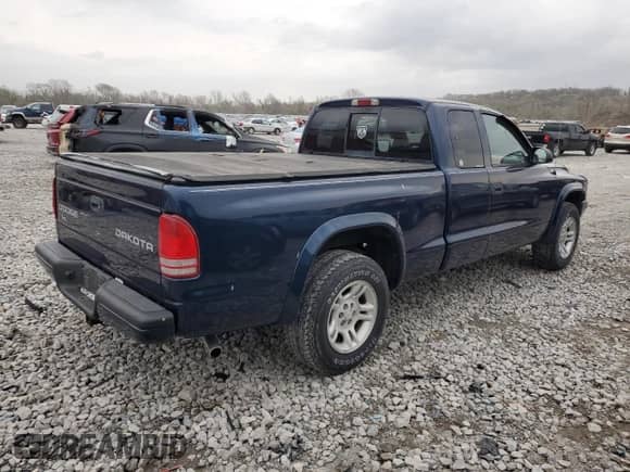 2003 Dodge Dakota Sport z VIN 1D7HL32NX3S170126, wystawiony jako Copart lot #51690845 z przebiegiem 188 057 mil mil oraz Szkoda całkowita • Salvage title. Historia ofert i sprzedaży dostępna na DreamBid. Obrazek 3.