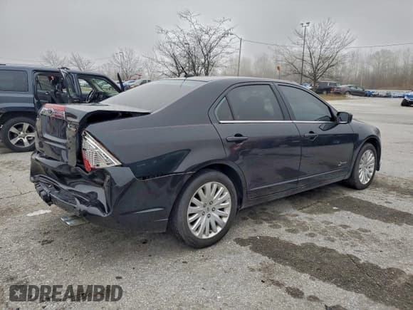 ✅ 2010 Ford Fusion Hybrid • VIN: 3FADP0L38AR324372 • Lot: 94102905. Listed on Copart with 124,591 mi. Free auction sales archive from the USA and detailed vehicle history report at DreamBid. Image 3.