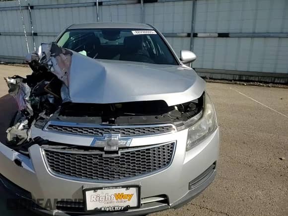 2014 Chevrolet Cruze 1LT с VIN 1G1PC5SB5E7359059, выставлен на аукционе Copart как лот 82290005 с пробегом 100 080 миль миль и Списание • Salvage title. История ставок и продаж доступна на DreamBid. Изображение 13.