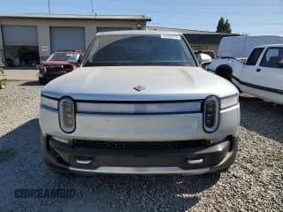 ✅ 2023 Rivian R1T Adventure • VIN: 7FCTGBAA0PN025046 • Lot: 62502274. Listed on Copart with 1,385 mi. Free auction sales archive from the USA and detailed vehicle history report at DreamBid. Image 5.