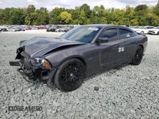 ✅ 2014 Dodge Charger RT • VIN: 2C3CDXCT1EH370154 • Lot: 80934955. Wystawiony na Copart z przebiegiem 124 401 mil. Bezpłatny archiwum sprzedaży aukcyjnych z USA i szczegółowy raport historii pojazdu na DreamBid. Zdjęcie 1.