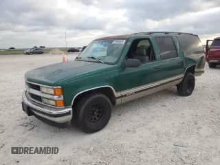 1999 Chevrolet Suburban с VIN 1GNEC16R6XJ415036, выставлен на аукционе Copart как лот 53565525 с пробегом 80 946 миль миль и Списание • Salvage title. История ставок и продаж доступна на DreamBid. Изображение 1.