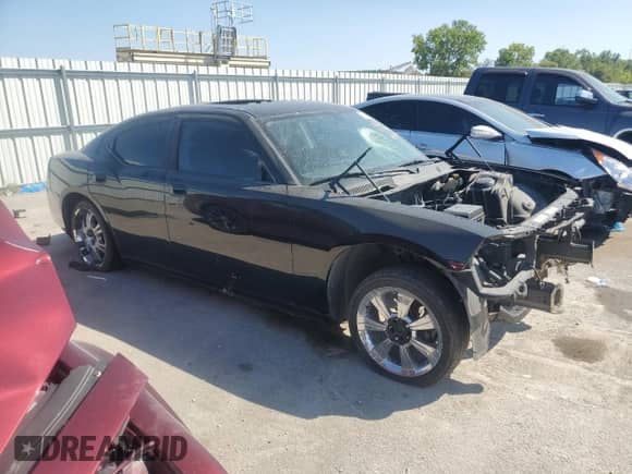 2009 Dodge Charger SRT-8 z VIN 2B3LA73W79H636864, wystawiony jako Copart lot #70624094 z przebiegiem Nie podano mil oraz Szkoda całkowita • Salvage title. Historia ofert i sprzedaży dostępna na DreamBid. Obrazek 4.