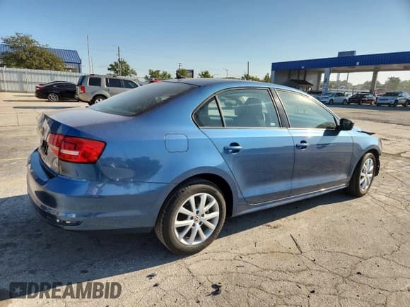 ✅ 2015 Volkswagen Jetta SE • VIN: 3VWD17AJXFM352651 • Lot: 80311455. Listed on Copart with 82,812 mi. Free auction sales archive from the USA and detailed vehicle history report at DreamBid. Image 3.