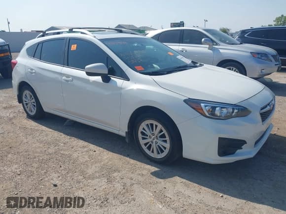 ✅ 2018 Subaru Impreza Premium • VIN: 4S3GTAB63J3733771 • Lot: 43139944. Listed on IAAI with 82,357 mi. Free auction sales archive from the USA and detailed vehicle history report at DreamBid. Image 1.