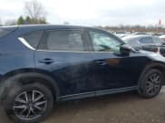 ✅ 2018 Mazda CX-5 Grand Touring • VIN: JM3KFBDM5J0426677 • Lot: 43579829. Listed on IAAI with 94,077 mi. Free auction sales archive from the USA and detailed vehicle history report at DreamBid. Image 13.