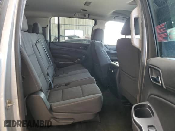 2018 Chevrolet Suburban LS z VIN 1GNSKGKC9JR129152, wystawiony jako Copart lot #51540075 z przebiegiem 371 516 mil mil oraz Czysty tytuł • Clean title. Historia ofert i sprzedaży dostępna na DreamBid. Obrazek 11.