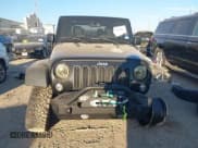 ✅ 2015 Jeep Wrangler Rubicon Hard Rock • VIN: 1C4BJWCGXFL525222 • Lot: 43651072. Listed on IAAI with 101,782 mi. Free auction sales archive from the USA and detailed vehicle history report at DreamBid. Image 13.