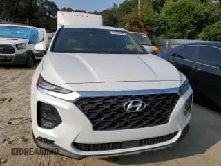 ✅ 2019 Hyundai Santa Fe SE • VIN: 5NMS2CAD6KH063886 • Lot: 67288084. Wystawiony na Copart z przebiegiem 100 332 mil. Bezpłatny archiwum sprzedaży aukcyjnych z USA i szczegółowy raport historii pojazdu na DreamBid. Zdjęcie 5.
