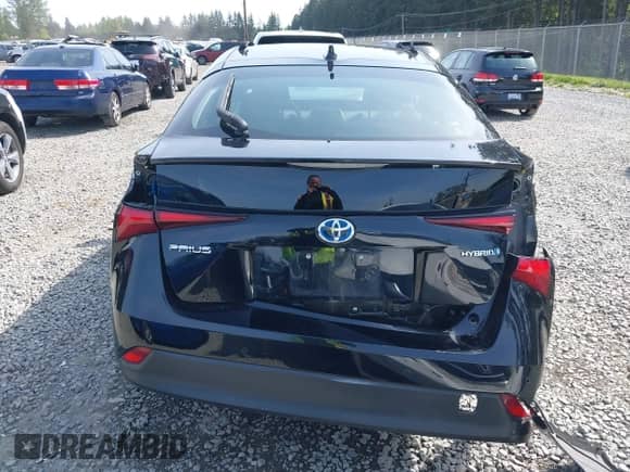 2021 Toyota Prius L Eco with VIN JTDKAMFU8M3136565, listed as a IAAI auction lot 42161896 with 39,634 mi miles and . Bid and sale history available at DreamBid. Image 17.