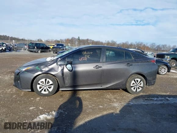 ✅ 2018 Toyota Prius Two • VIN: JTDKBRFU6J3604055 • Lot: 43826024. Listed on IAAI with 101,019 mi. Free auction sales archive from the USA and detailed vehicle history report at DreamBid. Image 14.