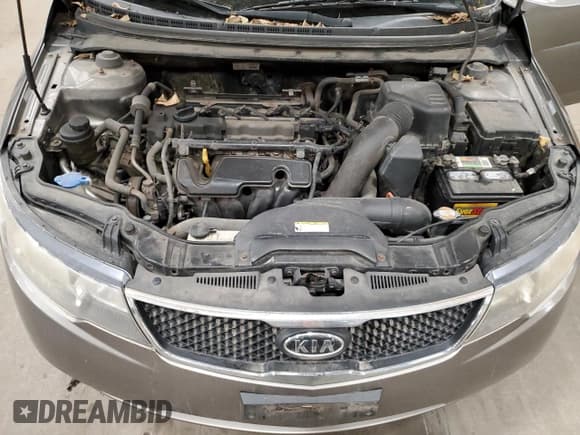 ✅ 2010 Kia Forte EX • VIN: KNAFU4A25A5858085 • Лот: 81429145. Опубликован ранее на Copart с пробегом 197 972 миль. Бесплатный доступ к архиву аукционных продаж из США и подробный отчёт об истории автомобиля на DreamBid. Изображение 11.