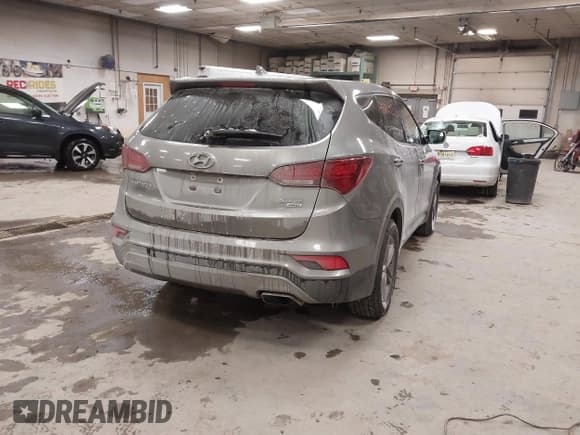 ✅ 2017 Hyundai Santa Fe 2.4L • VIN: 5NMZTDLB9HH000738 • Lot: 43829716. Listed on IAAI with 154,400 mi. Free auction sales archive from the USA and detailed vehicle history report at DreamBid. Image 4.