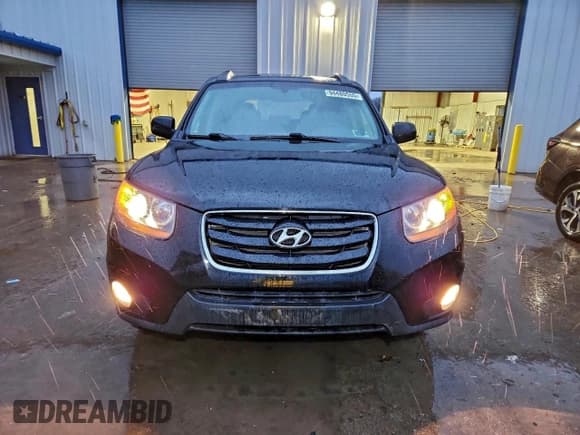 ✅ 2011 Hyundai Santa Fe Limited • VIN: 5XYZKDAG3BG034211 • Lot: 94480555. Listed on Copart with 108,798 mi. Free auction sales archive from the USA and detailed vehicle history report at DreamBid. Image 5.