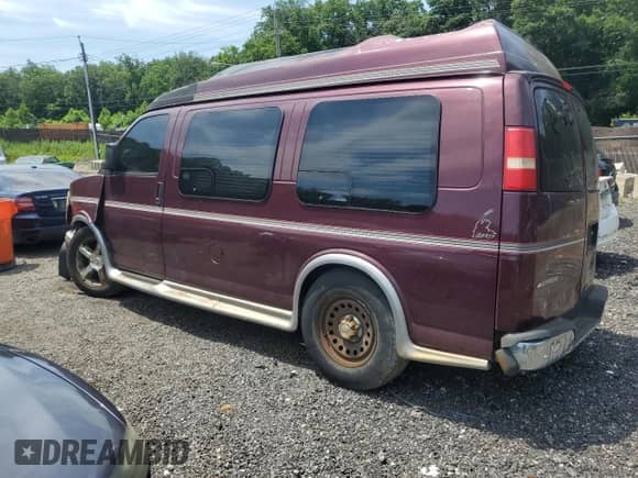 2003 Chevrolet Express Passenger with VIN 1GBFG15X431233061, listed as a Copart auction lot 62646375 with Not provided miles and Salvage title. Bid and sale history available at DreamBid. Image 2.