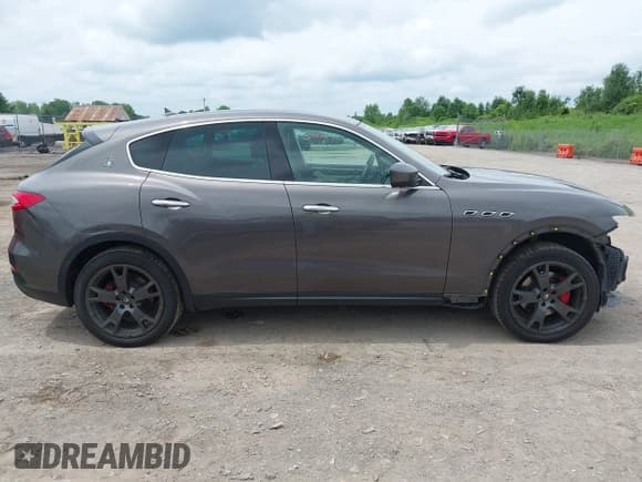 ✅ 2018 Maserati Levante • VIN: ZN661XUA2JX297461 • Lot: 42671491. Listed on IAAI with 96,952 mi. Free auction sales archive from the USA and detailed vehicle history report at DreamBid. Image 13.