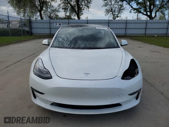 ✅ 2022 Tesla Model 3 • VIN: 5YJ3E1EA5NF201715 • Lot: 50732595. Listed on Copart with 116,913 mi. Free auction sales archive from the USA and detailed vehicle history report at DreamBid. Image 5.