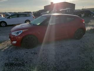 2012 Hyundai Veloster w/Red Int с VIN KMHTC6AD5CU067498, выставлен на аукционе Copart как лот 90810075 с пробегом 132 773 миль миль и Чистый • Clean title. История ставок и продаж доступна на DreamBid. Изображение 1.
