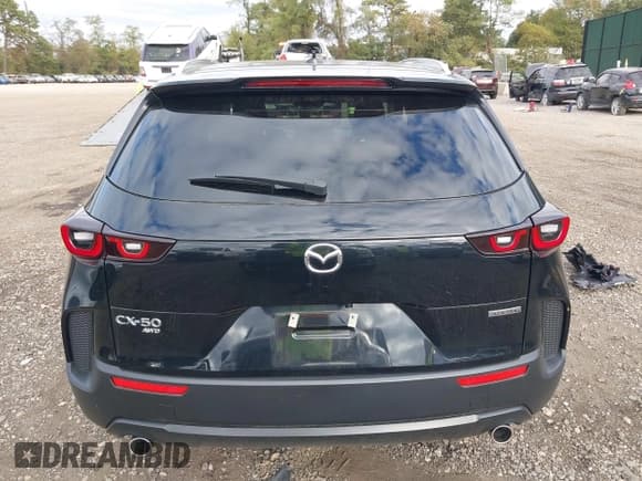 ✅ 2025 Mazda CX-50 S Premium • VIN: 7MMVABDMXSN333727 • Lot: 43414626. Wystawiony na IAAI z przebiegiem 4 268 mil. Bezpłatny archiwum sprzedaży aukcyjnych z USA i szczegółowy raport historii pojazdu na DreamBid. Zdjęcie 16.