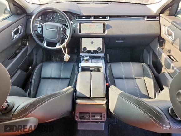 ✅ 2020 Land Rover Range Rover Velar S • VIN: SALYB2EX7LA274527 • Лот: 80365175. Опубликован ранее на Copart с пробегом 70 493 миль. Бесплатный доступ к архиву аукционных продаж из США и подробный отчёт об истории автомобиля на DreamBid. Изображение 8.