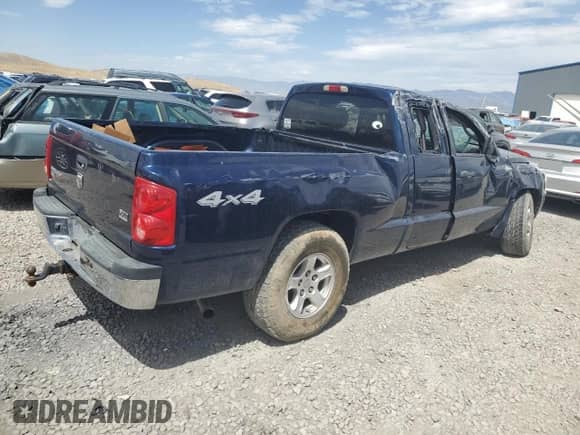 2006 Dodge Dakota SLT with VIN 1D7HW42N36S589971, listed as a Copart auction lot 65447555 with 254,187 mi miles and Salvage title. Bid and sale history available at DreamBid. Image 3.