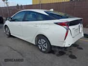 ✅ 2018 Toyota Prius Two • VIN: JTDKBRFU3J3590860 • Lot: 43486808. Listed on IAAI with 92,820 mi. Free auction sales archive from the USA and detailed vehicle history report at DreamBid. Image 3.