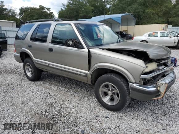 2001 Chevrolet Blazer LT z VIN 1GNCS13W512145867, wystawiony jako Copart lot #71829304 z przebiegiem 358 800 mil mil oraz Szkoda całkowita • Salvage title. Historia ofert i sprzedaży dostępna na DreamBid. Obrazek 4.