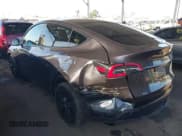 ✅ 2024 Tesla Model Y • VIN: 7SAYGDED1RF209346 • Lot: 43149037. Wystawiony na IAAI z przebiegiem 10 213 mil. Bezpłatny archiwum sprzedaży aukcyjnych z USA i szczegółowy raport historii pojazdu na DreamBid. Zdjęcie 3.