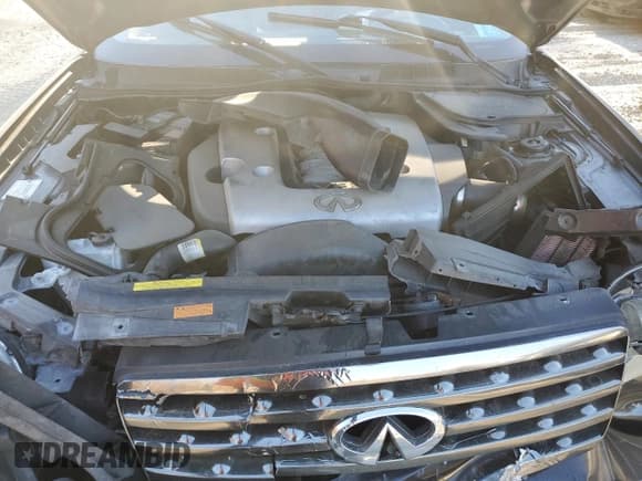 ✅ 2007 Infiniti FX • VIN: JNRBS08W27X400395 • Лот: 90846015. Опубликован ранее на Copart с пробегом Не указан. Бесплатный доступ к архиву аукционных продаж из США и подробный отчёт об истории автомобиля на DreamBid. Изображение 12.