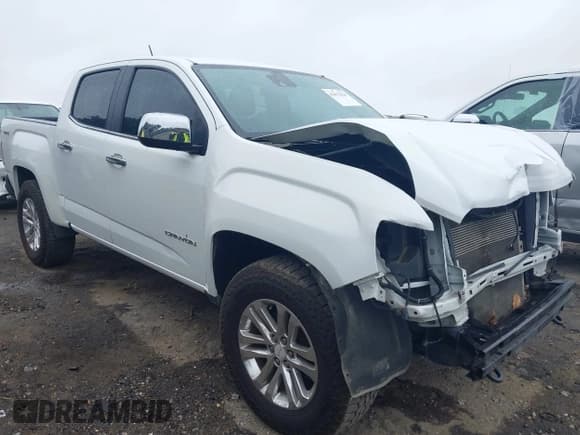 ✅ 2015 GMC Canyon 4WD SLT • VIN: 1GTG6CE34F1213456 • Лот: 42412224. Опубликован ранее на IAAI с пробегом 202 573 миль. Бесплатный доступ к архиву аукционных продаж из США и подробный отчёт об истории автомобиля на DreamBid. Изображение 1.