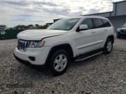 ✅ 2011 Jeep Grand Cherokee Laredo • VIN: 1J4RR4GG6BC589946 • Lot: 86253095. Listed on Copart with 164,963 mi. Free auction sales archive from the USA and detailed vehicle history report at DreamBid. Image 1.