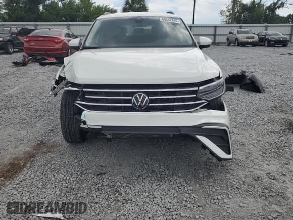 ✅ 2024 Volkswagen Tiguan S • VIN: 3VVRB7AX8RM107315 • Lot: 80452895. Wystawiony na Copart z przebiegiem 31 466 mil. Bezpłatny archiwum sprzedaży aukcyjnych z USA i szczegółowy raport historii pojazdu na DreamBid. Zdjęcie 5.
