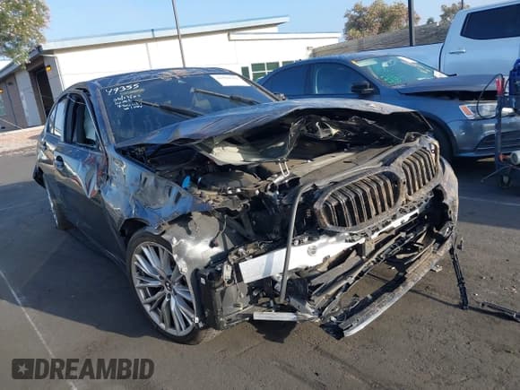 ✅ 2023 BMW 3 Series 330i • VIN: 3MW69FF07P8D57148 • Лот: 42559311. Опубликован ранее на IAAI с пробегом 37 540 миль. Бесплатный доступ к архиву аукционных продаж из США и подробный отчёт об истории автомобиля на DreamBid. Изображение 1.