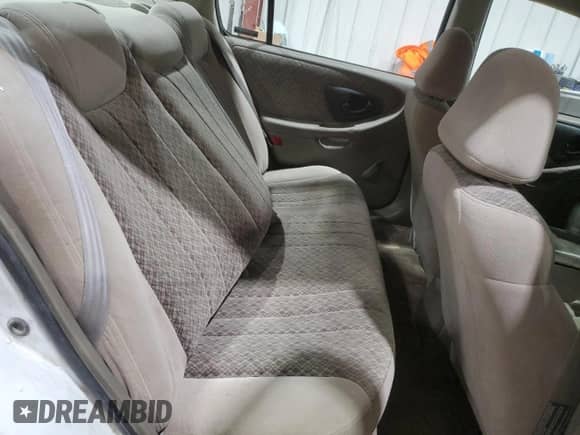 2000 Chevrolet Malibu z VIN 1G1ND52J7Y6273385, wystawiony jako Copart lot #86611774 z przebiegiem 178 236 mil mil oraz Czysty tytuł • Clean title. Historia ofert i sprzedaży dostępna na DreamBid. Obrazek 11.