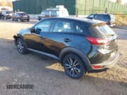 ✅ 2018 Mazda CX-3 Touring • VIN: JM1DKFC71J0332618 • Lot: 43587481. Listed on IAAI with 48,473 mi. Free auction sales archive from the USA and detailed vehicle history report at DreamBid. Image 3.