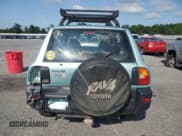 ✅ 1997 Toyota RAV4 • VIN: JT3HP10VXV7030982 • Lot: 61766055. Wystawiony na Copart z przebiegiem 215 866 mil. Bezpłatny archiwum sprzedaży aukcyjnych z USA i szczegółowy raport historii pojazdu na DreamBid. Zdjęcie 6.