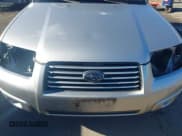 ✅ 2007 Subaru Forester X • VIN: JF1SG65677H737329 • Lot: 43611395. Listed on IAAI with 110,691 mi. Free auction sales archive from the USA and detailed vehicle history report at DreamBid. Image 6.