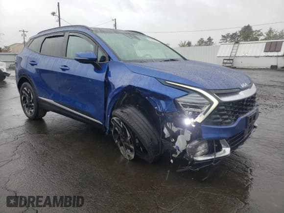 ✅ 2023 Kia Sportage SX-Prestige • VIN: 5XYK5CAF1PG011933 • Lot: 90711965. Listed on Copart with 50,013 mi. Free auction sales archive from the USA and detailed vehicle history report at DreamBid. Image 4.