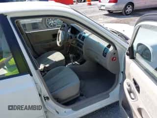 2005 Hyundai Accent GLS z VIN KMHCG45C35U641013, wystawiony jako IAAI lot #43015581 z przebiegiem 158 018 mil mil oraz . Historia ofert i sprzedaży dostępna na DreamBid. Obrazek 5.