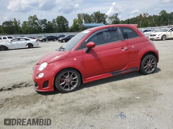 ✅ 2015 FIAT 500 Abarth • VIN: 3C3CFFFH9FT609924 • Lot: 70311715. Listed on Copart with 84,012 mi. Free auction sales archive from the USA and detailed vehicle history report at DreamBid. Image 1.