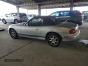 ✅ 1999 Mazda MX-5 Miata • VIN: JM1NB3530X0104289 • Лот: 82217305. Опубликован ранее на Copart с пробегом 150 760 миль. Бесплатный доступ к архиву аукционных продаж из США и подробный отчёт об истории автомобиля на DreamBid. Изображение 2.