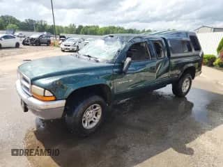 2002 Dodge Dakota SLT с VIN 1B7GG42N52S717818, выставлен на аукционе Copart как лот 61561785 с пробегом 133 580 миль миль и На запчасти • Non repairable. История ставок и продаж доступна на DreamBid. Изображение 1.