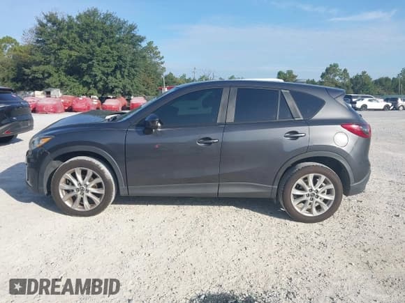 ✅ 2014 Mazda CX-5 Grand Touring • VIN: JM3KE2DY7E0300395 • Лот: 43293604. Опубликован ранее на IAAI с пробегом 161 782 миль. Бесплатный доступ к архиву аукционных продаж из США и подробный отчёт об истории автомобиля на DreamBid. Изображение 14.