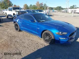 2018 Ford Mustang GT с VIN 1FA6P8CFXJ5165276, выставлен на аукционе IAAI как лот 43469214 с пробегом 76 076 миль миль и . История ставок и продаж доступна на DreamBid. Изображение 1.