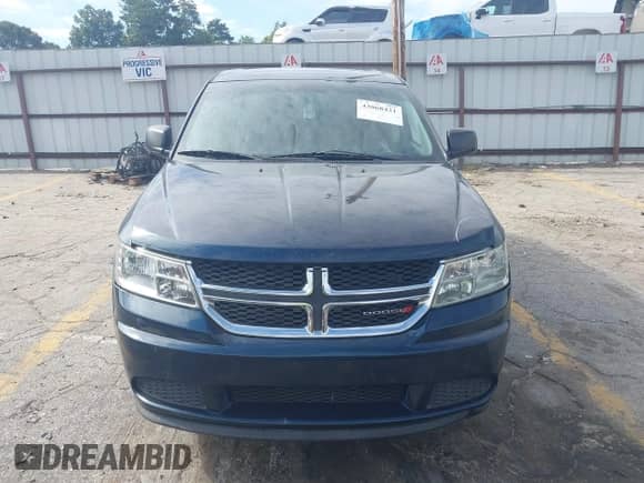 2015 Dodge Journey American Value z VIN 3C4PDCABXFT610861, wystawiony jako IAAI lot #43068421 z przebiegiem 153 937 mil mil oraz . Historia ofert i sprzedaży dostępna na DreamBid. Obrazek 12.
