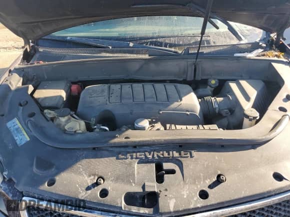 2009 Chevrolet Traverse LS z VIN 1GNER13D29S169705, wystawiony jako Copart lot #84829105 z przebiegiem 215 828 mil mil oraz Czysty tytuł • Clean title. Historia ofert i sprzedaży dostępna na DreamBid. Obrazek 11.