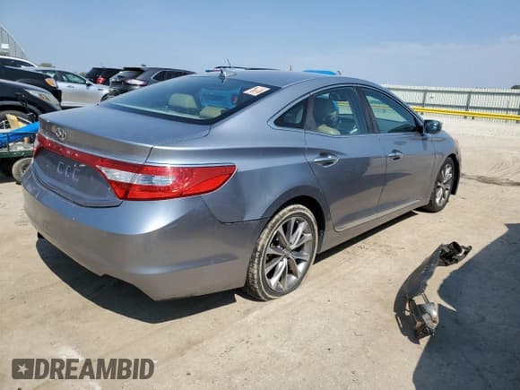 ✅ 2015 Hyundai Azera • VIN: KMHFG4JG8FA446887 • Lot: 81228745. Listed on Copart with 164,148 mi. Free auction sales archive from the USA and detailed vehicle history report at DreamBid. Image 3.