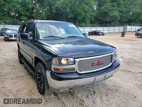 ✅ 2004 GMC Yukon SLE • VIN: 1GKEC13T04R185939 • Lot: 64313445. Listed on Copart with 242,805 mi. Free auction sales archive from the USA and detailed vehicle history report at DreamBid. Image 14.